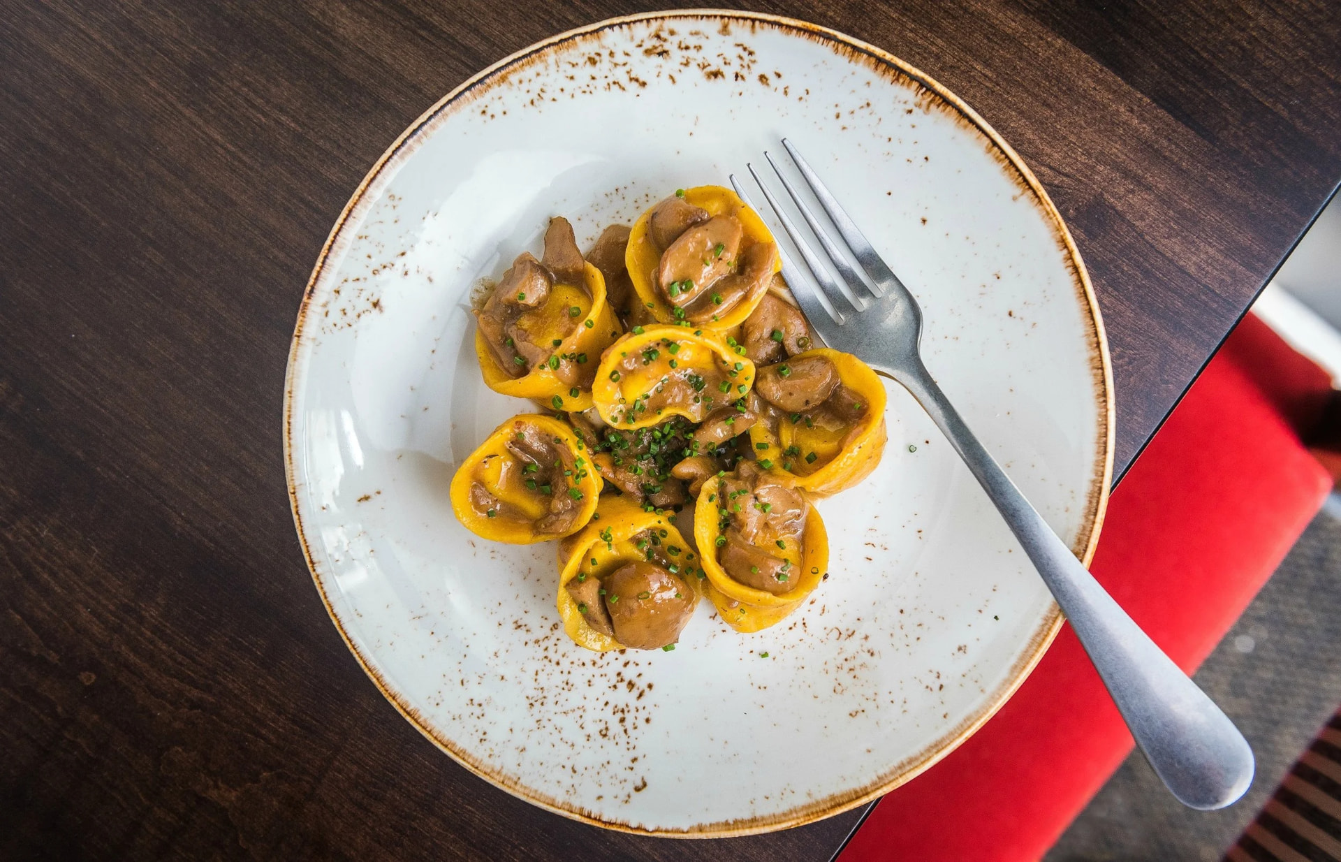 Handmade tortelli plated at San Lorenzo